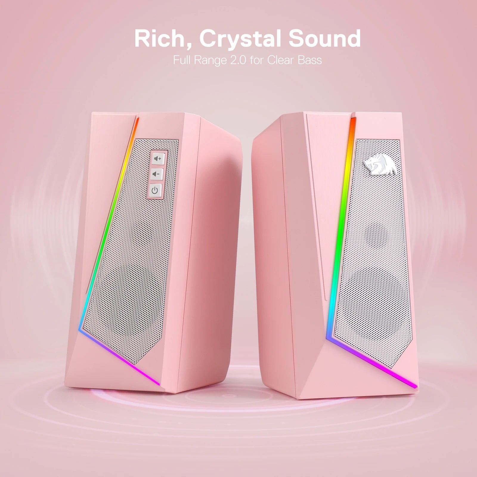 The Redragon GS520 Anvil RGB desktop speakers shown in a stylish pink color, with text highlighting "Rich, Crystal Sound".