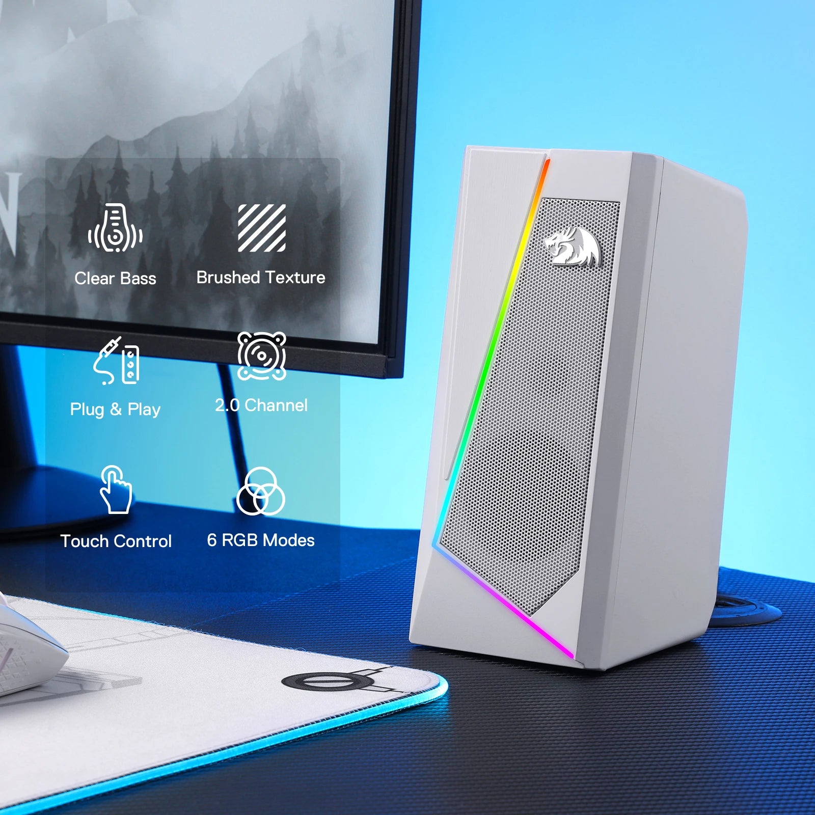 The white Redragon GS520 speaker on a gaming desk, with an infographic showing its features: clear bass, brushed texture, plug & play, and 6 RGB modes.