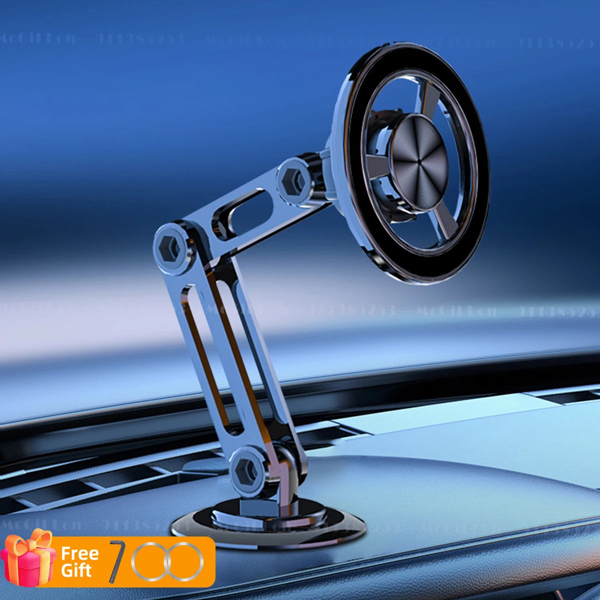 The silver McGiLLon articulating magnetic phone mount shown on a car dashboard under blue ambient light.