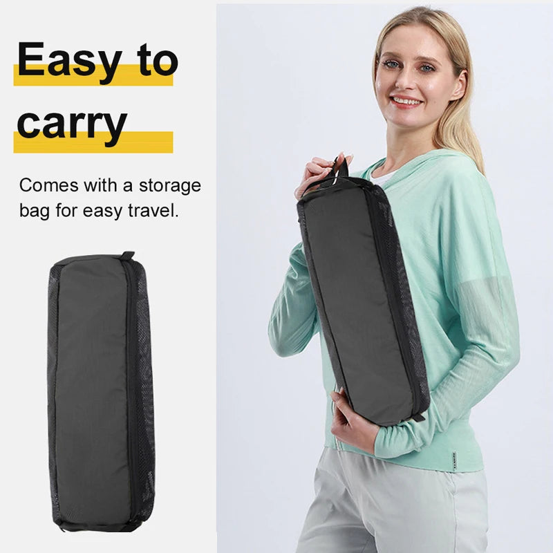 An image showing a model holding the compact storage bag for the Westtune camping chair, demonstrating that it is easy to carry.