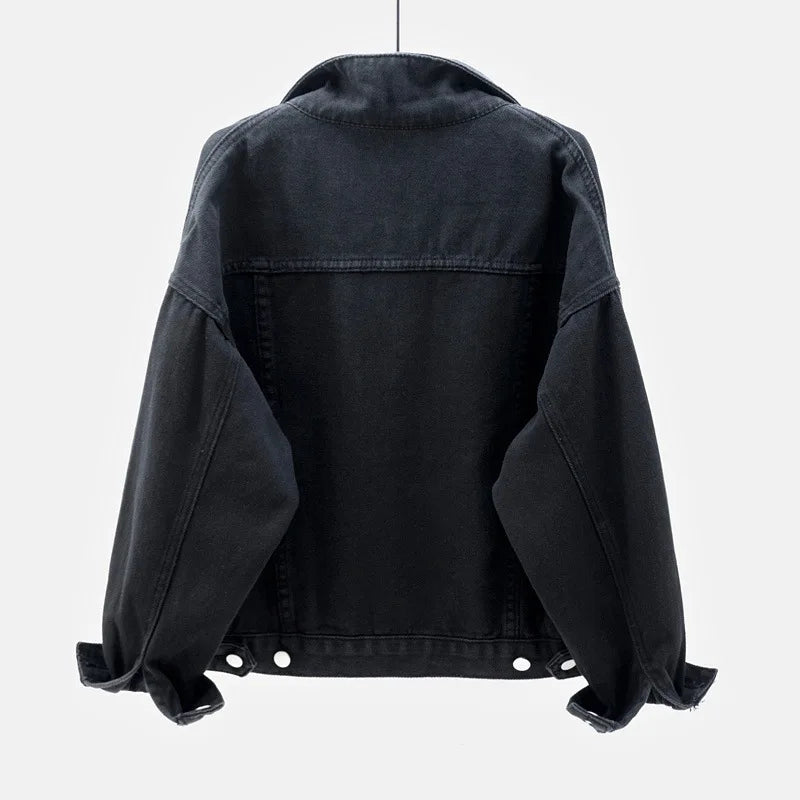 The back view of the women's oversized classic denim jacket in a classic black color.