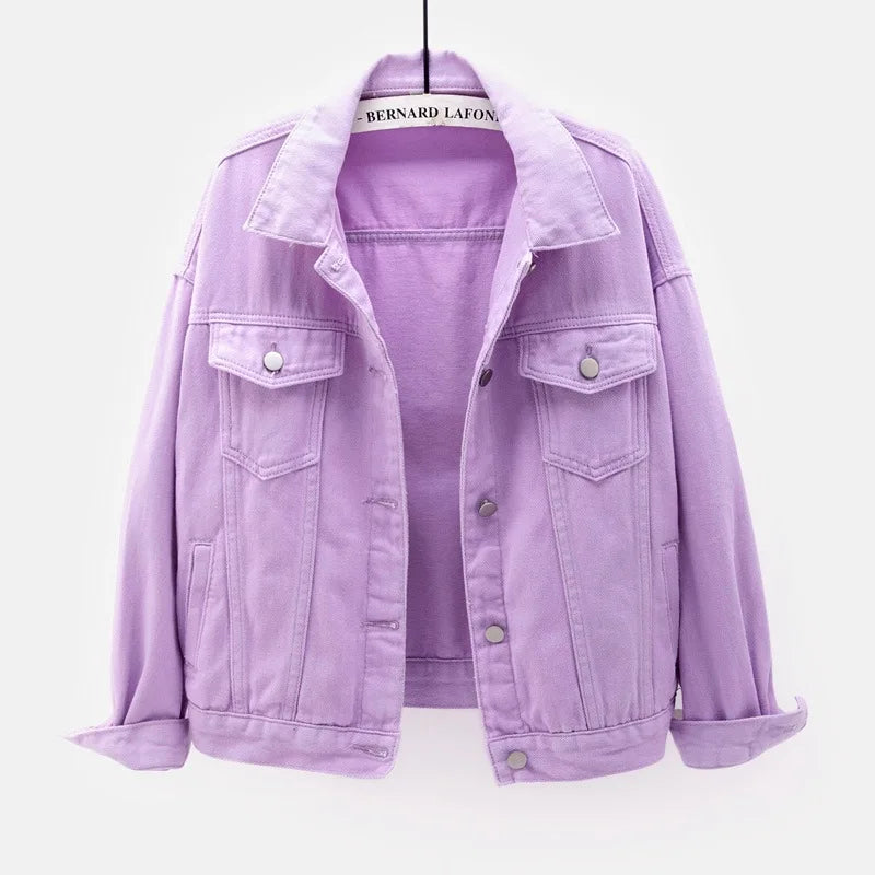 The women's oversized classic denim jacket in a pastel purple color, shown from the front.