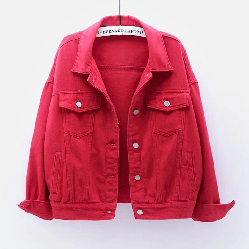 The women's oversized classic denim jacket in a vibrant red color, shown from the front.