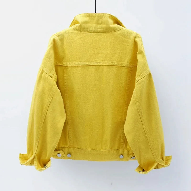 The back view of the women's oversized classic denim jacket in a bright yellow color.