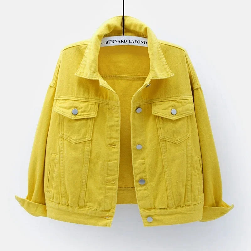 The women's oversized classic denim jacket in a bright yellow color, shown from the front.