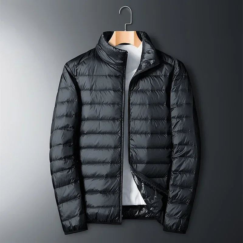 The ArcticWave men's lightweight down jacket shown in a classic black color.