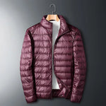The ArcticWave men's lightweight down jacket shown in a stylish burgundy color.