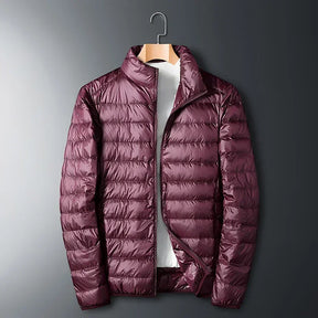 The ArcticWave men's lightweight down jacket shown in a stylish burgundy color.