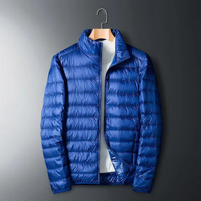 The ArcticWave men's lightweight down jacket shown in a vibrant royal blue color.