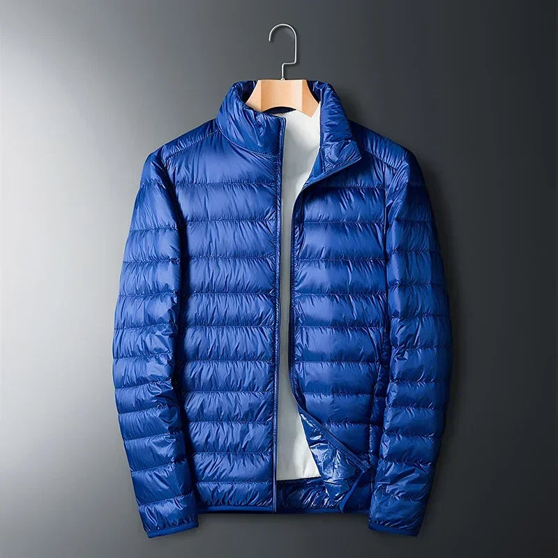 The ArcticWave men's lightweight down jacket shown in a vibrant royal blue color.