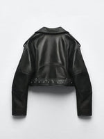 The back view of the black faux leather moto jacket, displaying the belted hem and shoulder details.