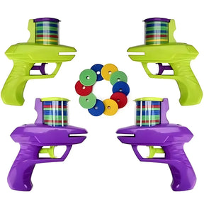 A full playset of the FunBox toy, including two green and two purple disc launchers with a circle of colorful foam discs.