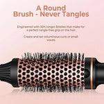 A close-up of the hot curl brush head, highlighting the longer, tangle-free bristles designed to grip hair for voluminous curls.