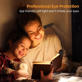 A mother and daughter reading in bed, using the clip-on LED book light which provides professional, eye-friendly soft light.