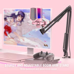 The pink FIFINE A6T microphone mounted on its sturdy and adjustable boom arm stand over a gaming console.
