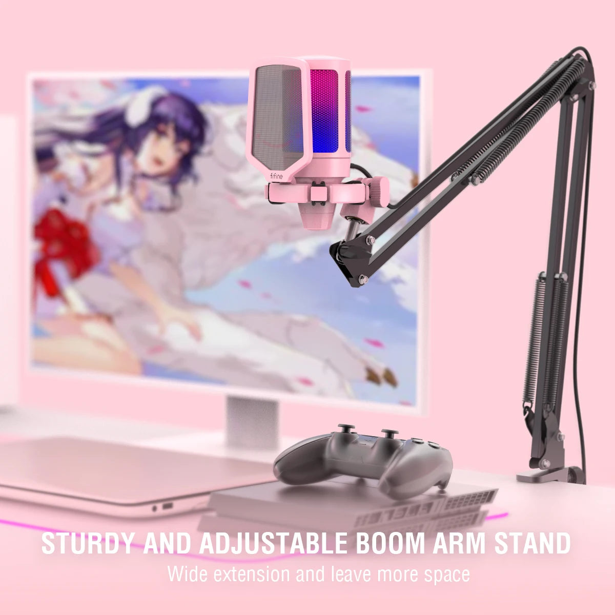 The pink FIFINE A6T microphone mounted on its sturdy and adjustable boom arm stand over a gaming console.
