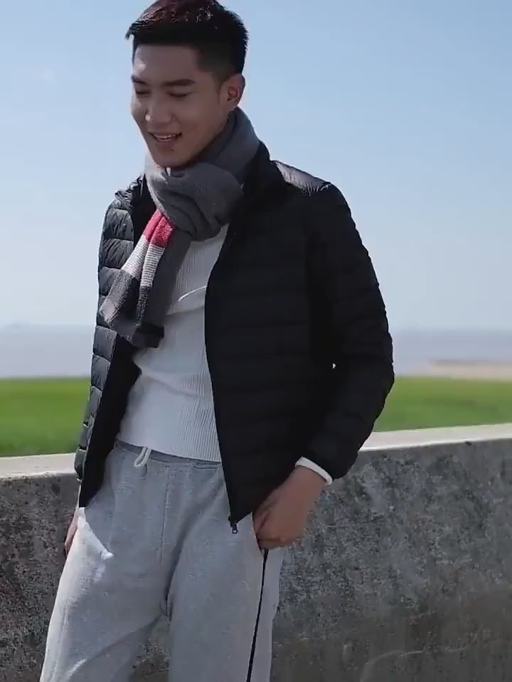 A video demonstrating the lightweight and flexible nature of the ArcticWave men's down jacket.