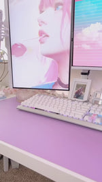 An unboxing and showcase video of the white Redragon GS520 Anvil speakers, demonstrating the dynamic RGB lighting effects and showing them as part of a stylish, modern desktop setup.