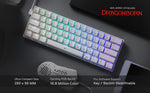 The Redragon K630 Dragonborn 60% wired keyboard on a desk setup, highlighting its ultra-compact size and dazzling RGB backlight.