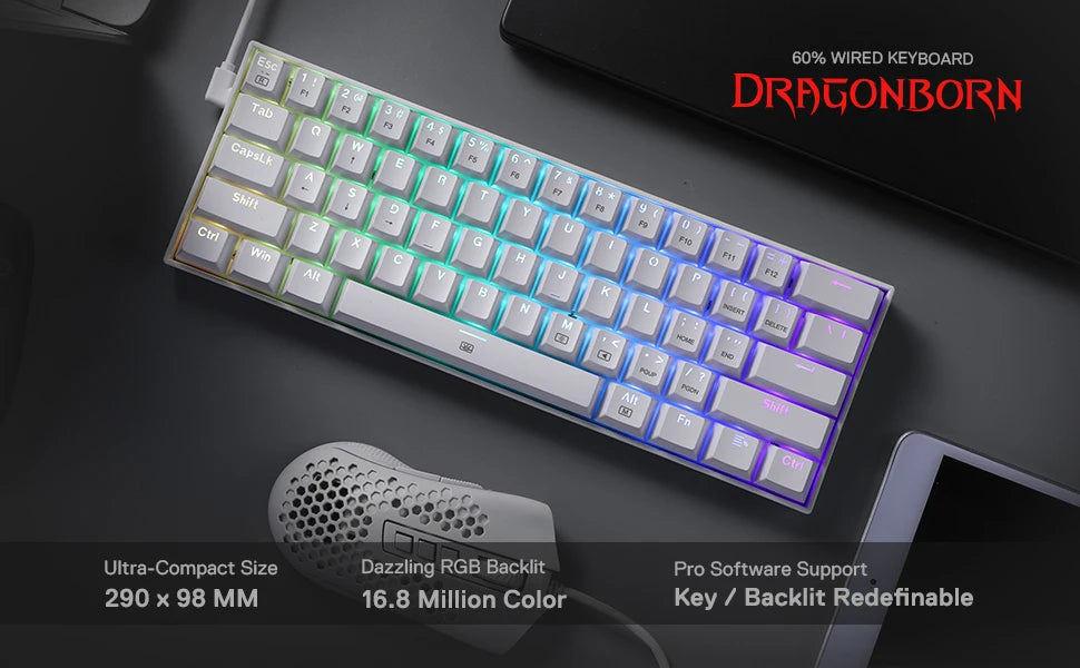 The Redragon K630 Dragonborn 60% wired keyboard on a desk setup, highlighting its ultra-compact size and dazzling RGB backlight.