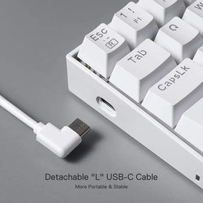 A close-up of the Redragon K630 keyboard showing the detachable "L" shaped USB-C cable for portability.