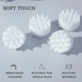 A close-up of the soft silicone massage heads, with icons indicating they are removable for cleaning, suitable for the whole body, and made of silicone material.