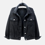 The women's oversized classic denim jacket in a classic black color, shown from the front.