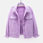 The women's oversized classic denim jacket in a pastel purple color, shown from the front.