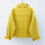 The back view of the women's oversized classic denim jacket in a bright yellow color.