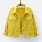The women's oversized classic denim jacket in a bright yellow color, shown from the front.
